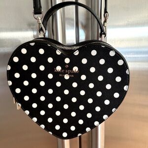 Kate Spade heart shaped pocketbook. Black with white polka dots.